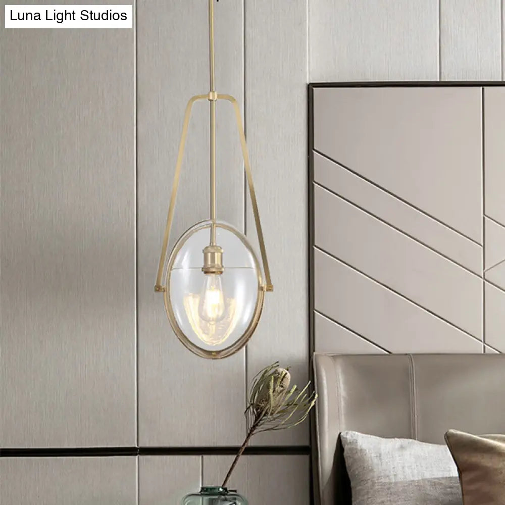 Sleek Gold Elliptical Hanging Ceiling Light With Clear Glass Drop - Ideal For Dining Room 1 Head