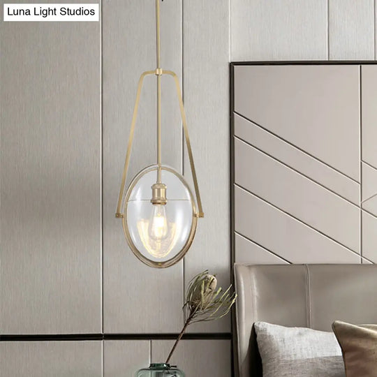 Sleek Gold Elliptical Hanging Ceiling Light With Clear Glass Drop - Ideal For Dining Room 1 Head