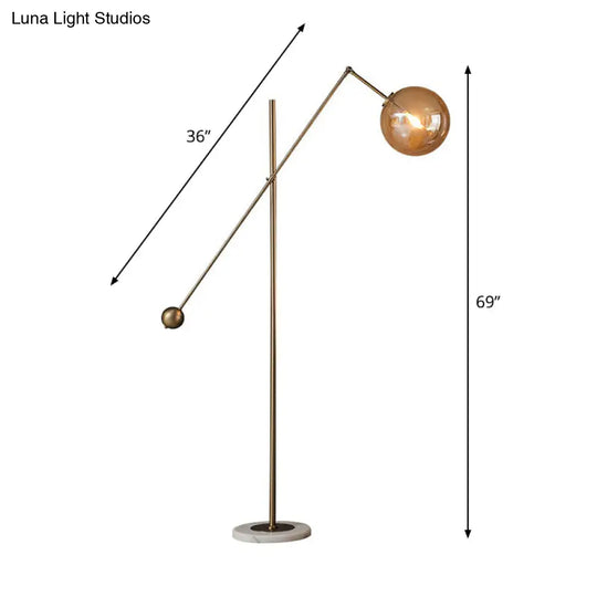 Simplicity 1-Light Bronze Amber Glass Sphere Floor Lamp With Balance Arm