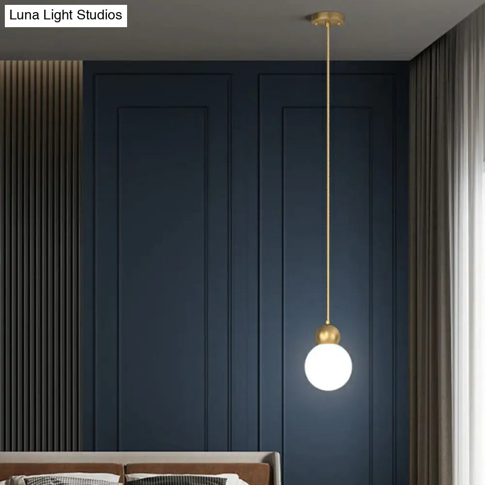 Simplicity Gold Finish Ball Pendant Light Fixture 1-Light Milk Glass Suspension For Bedroom