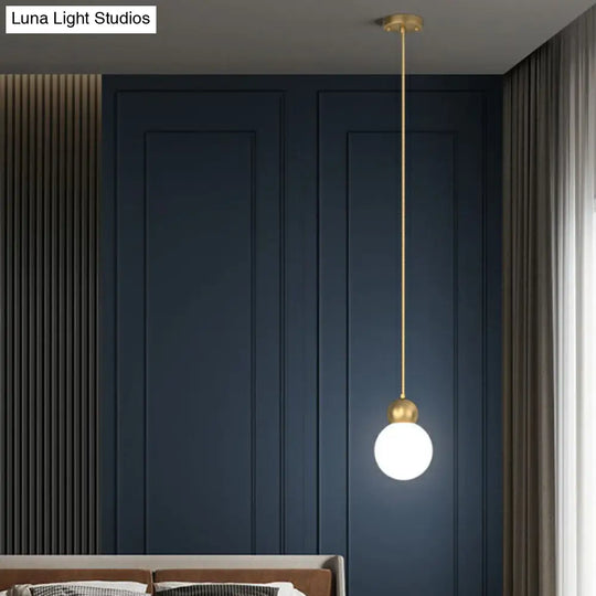 Simplicity Gold Finish Ball Pendant Light Fixture 1-Light Milk Glass Suspension For Bedroom