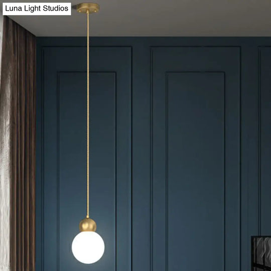 Simplicity Gold Finish Ball Pendant Light Fixture 1-Light Milk Glass Suspension For Bedroom