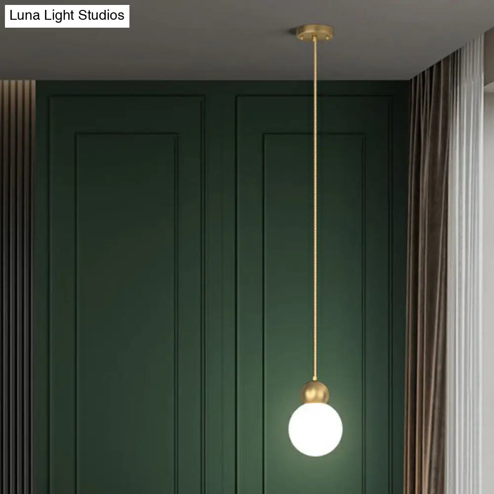 Simplicity Gold Finish Ball Pendant Light Fixture 1-Light Milk Glass Suspension For Bedroom