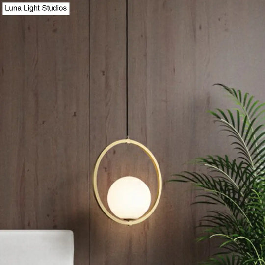 Simplicity Single Brass Pendant Lamp With Opaque Glass Shade And Metal Ring - Ball Suspension