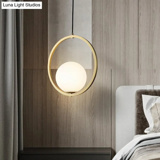 Simplicity Single Brass Pendant Lamp With Opaque Glass Shade And Metal Ring - Ball Suspension