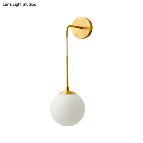 Simplicity White Glass Wall Sconce - Brass Finish Bedroom Light Fixture With 1 Bulb