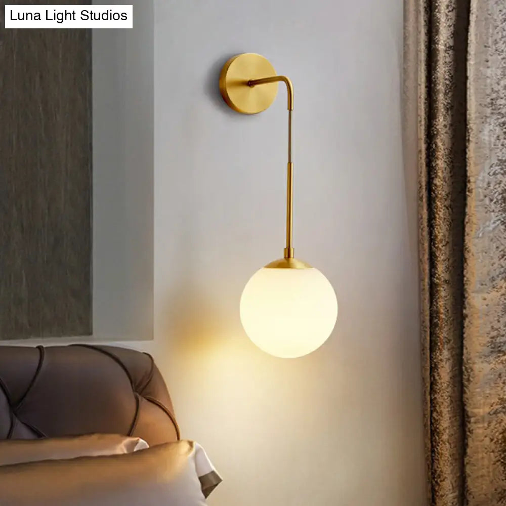 Simplicity White Glass Wall Sconce - Brass Finish Bedroom Light Fixture With 1 Bulb