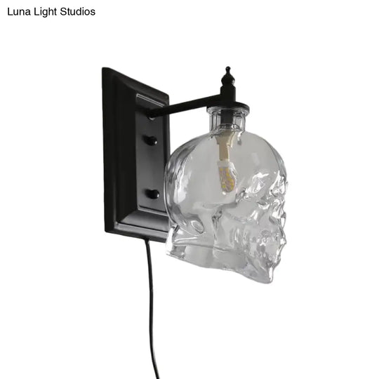 Skull Sconce Lamp - Clear Glass Decorative Wall Mounted Lighting Fixture With 1-Light In Black