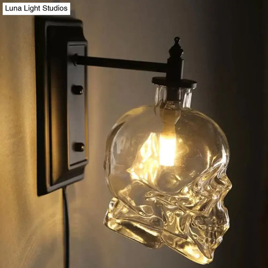 Skull Sconce Lamp - Clear Glass Decorative Wall Mounted Lighting Fixture With 1-Light In Black