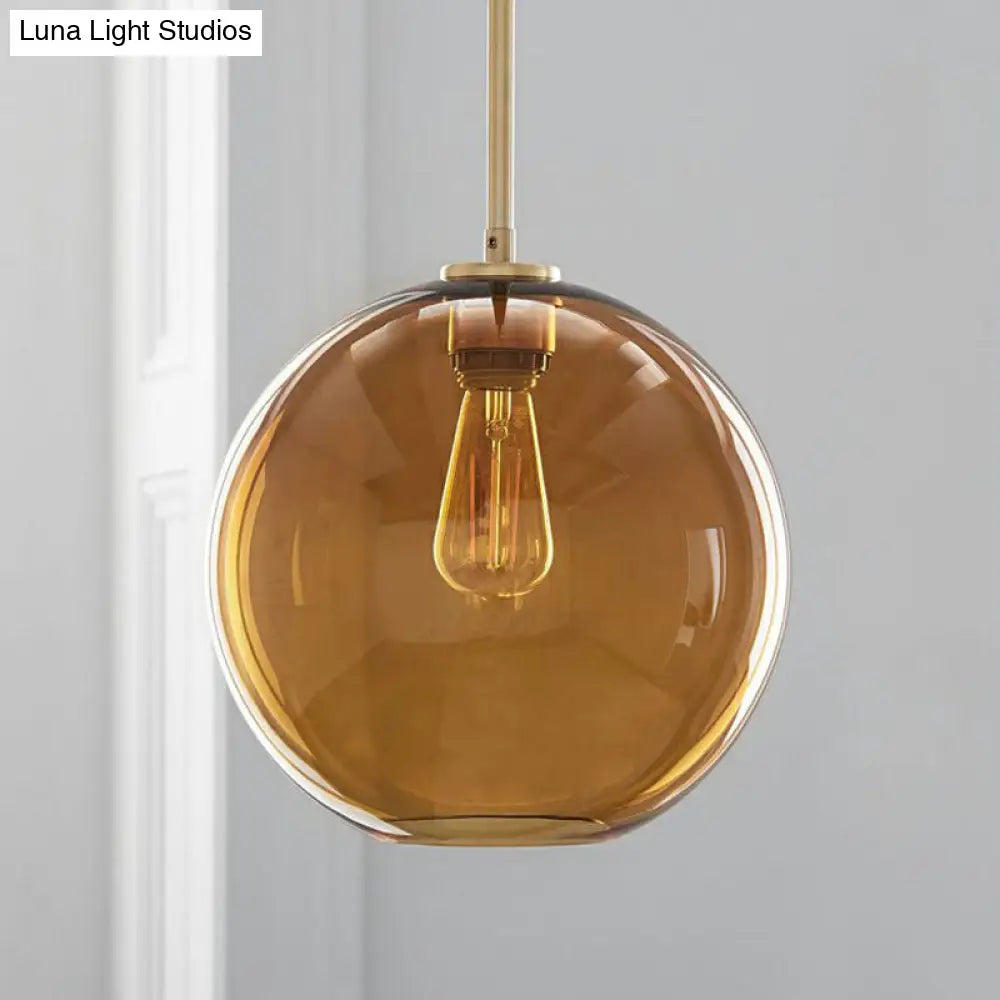 Sleek 1-Light Suspension Pendant With Globe Glass Shade - Perfect For Dining Room Ceilings Brown