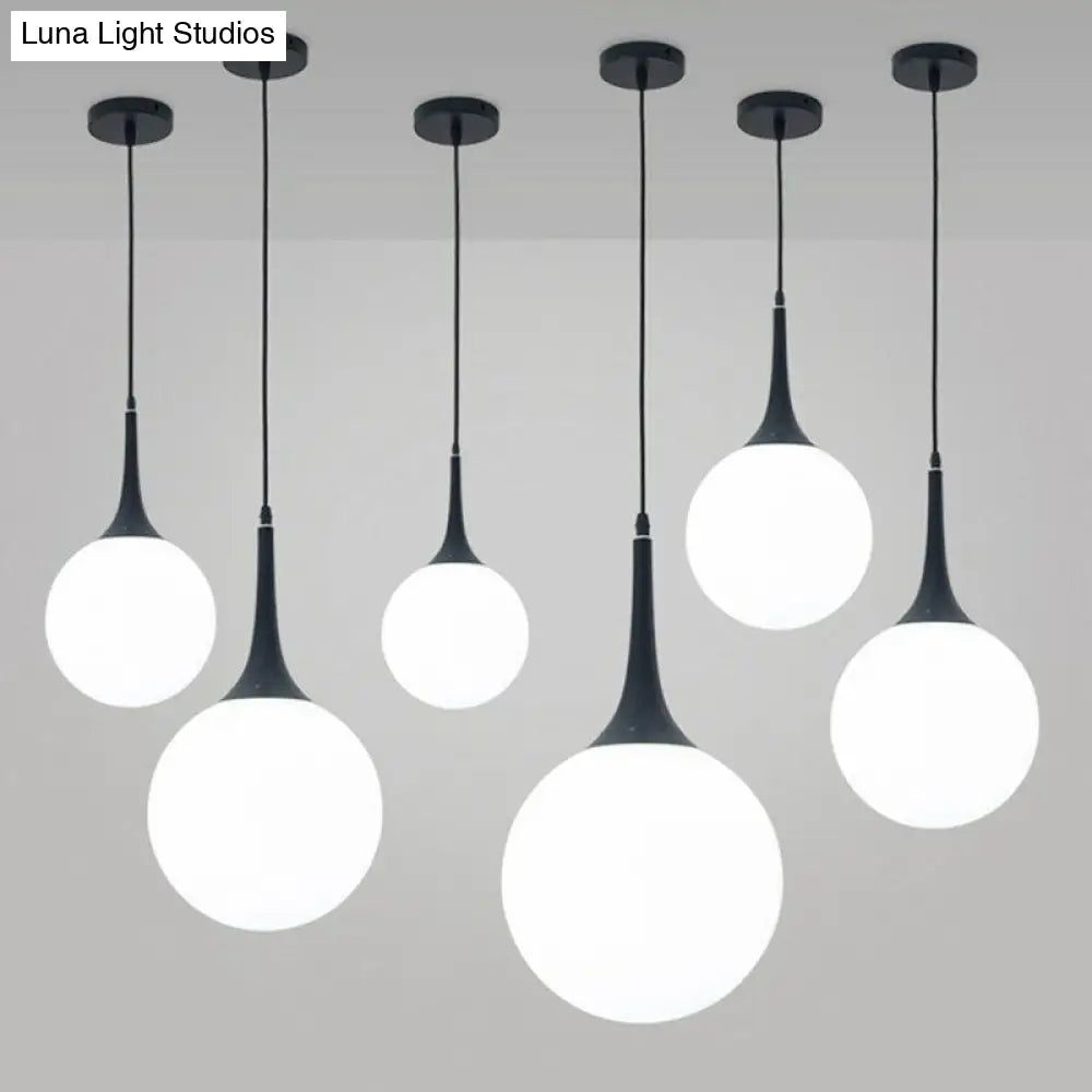 Sleek Cream Glass Pendant Light For Dining Room Minimalist Spherical Suspension