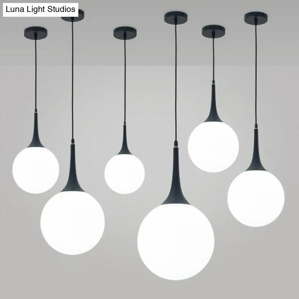 Sleek 1-Light Suspension Pendant: Minimalist Glass Hanging Light For Dining Room