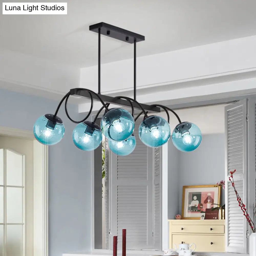 Sleek Black Glass Sphere Island Light For Modern Dining Rooms