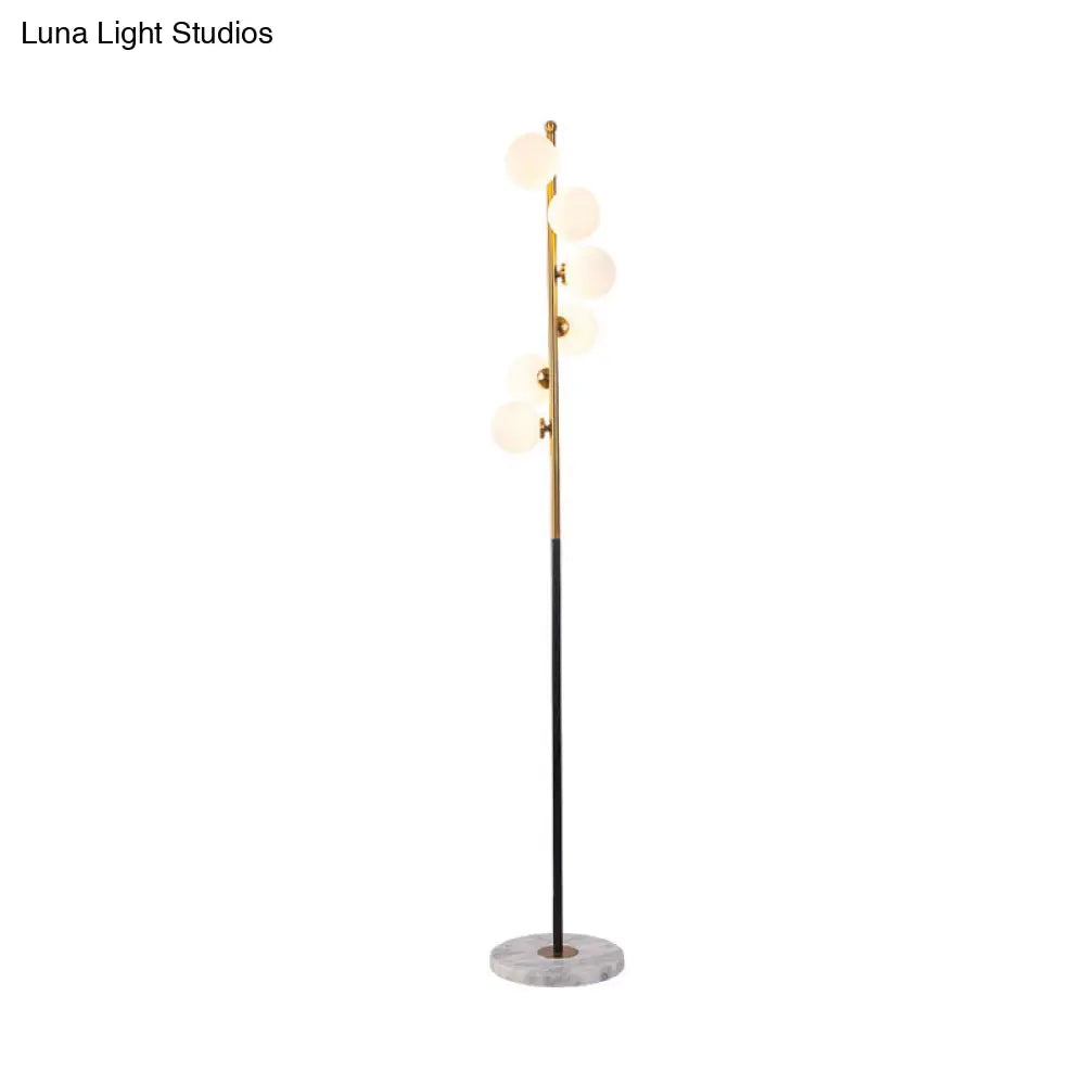 Sleek Black-Gold Led Floor Lamp With Glass Stand And Spiral Design For Study Room