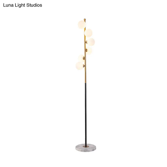 Sleek Black-Gold Led Floor Lamp With Glass Stand And Spiral Design For Study Room