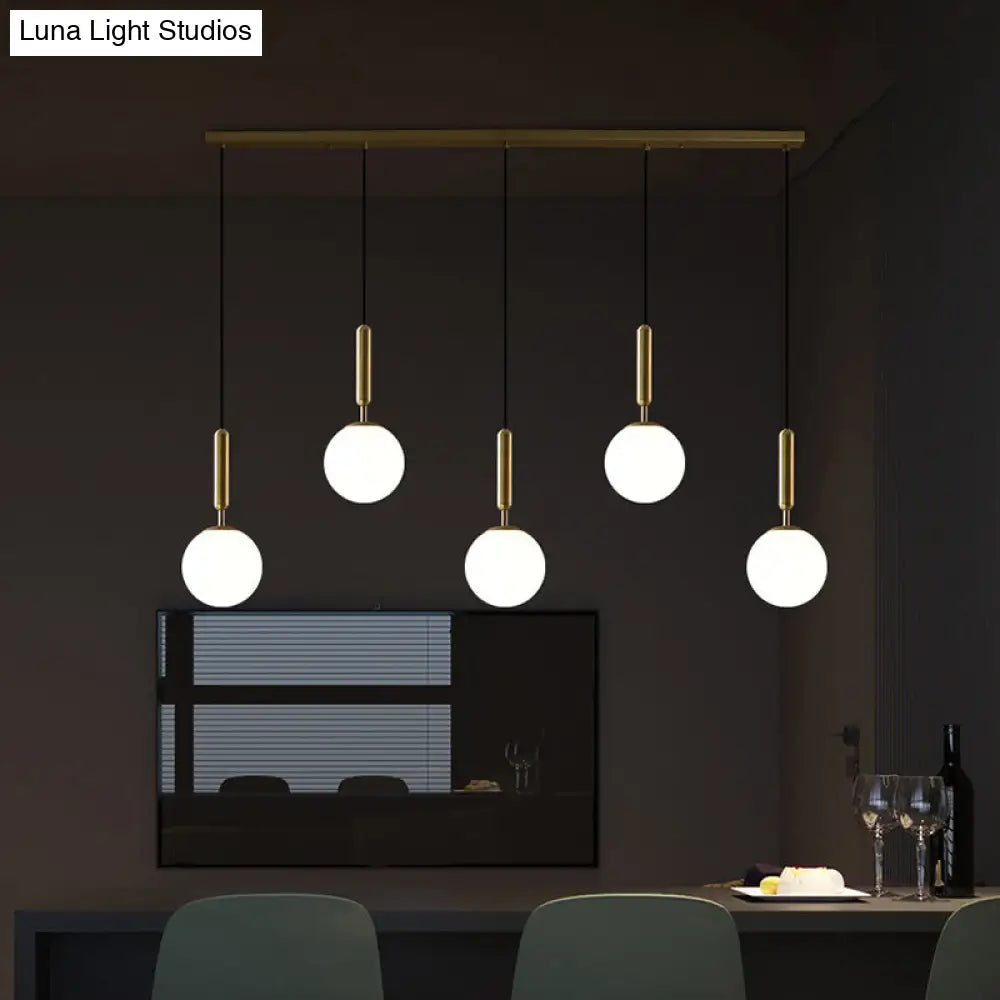 Sleek Brass Ball Pendant Light For Open Kitchen Simplicity Glass Ceiling Fixture