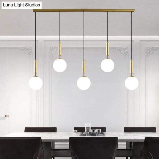 Sleek Brass Ball Pendant Light For Open Kitchen Simplicity Glass Ceiling Fixture 5 / White
