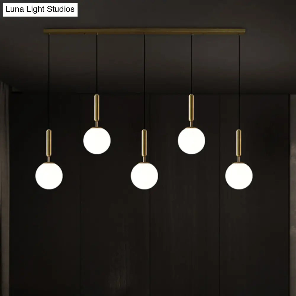 Sleek Brass Ball Pendant Light For Open Kitchen - Simplicity Glass Ceiling Fixture