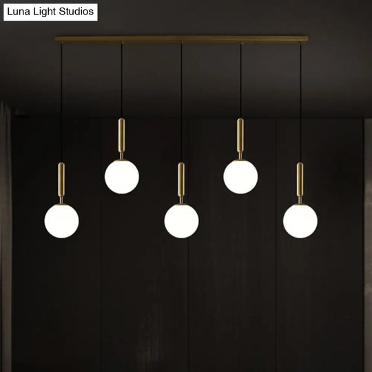 Sleek Brass Ball Pendant Light For Open Kitchen Simplicity Glass Ceiling Fixture