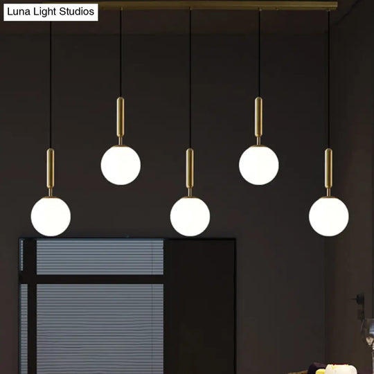 Sleek Brass Ball Pendant Light For Open Kitchen - Simplicity Glass Ceiling Fixture