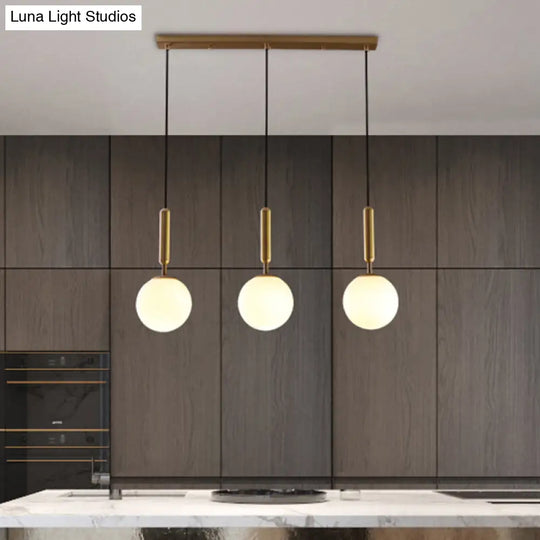 Sleek Brass Ball Pendant Light For Open Kitchen Simplicity Glass Ceiling Fixture 3 / White