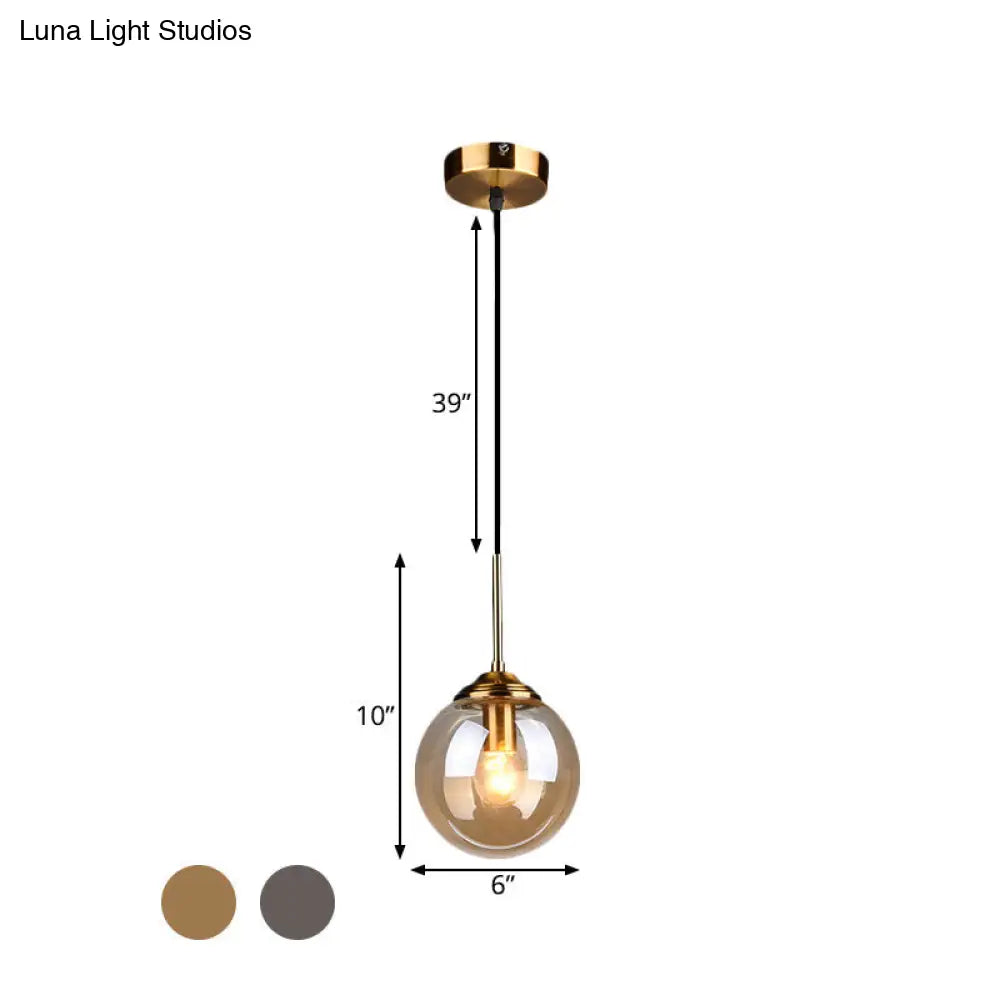 Brass Pendant Lamp With Spherical Amber/Smoke Glass Shade For Dining Room Ceiling