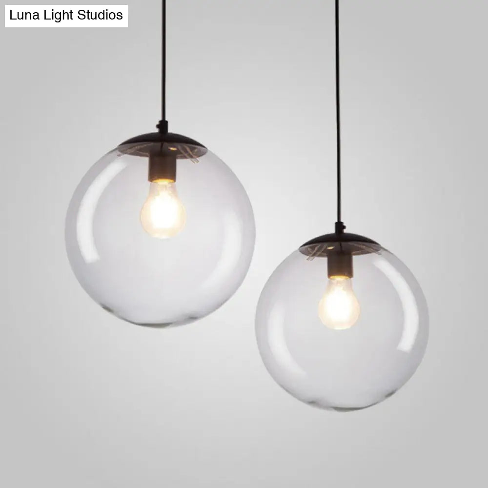 Sleek Clear Glass Pendant Light With A Touch Of Simplicity - Black Spherical Design Suspended