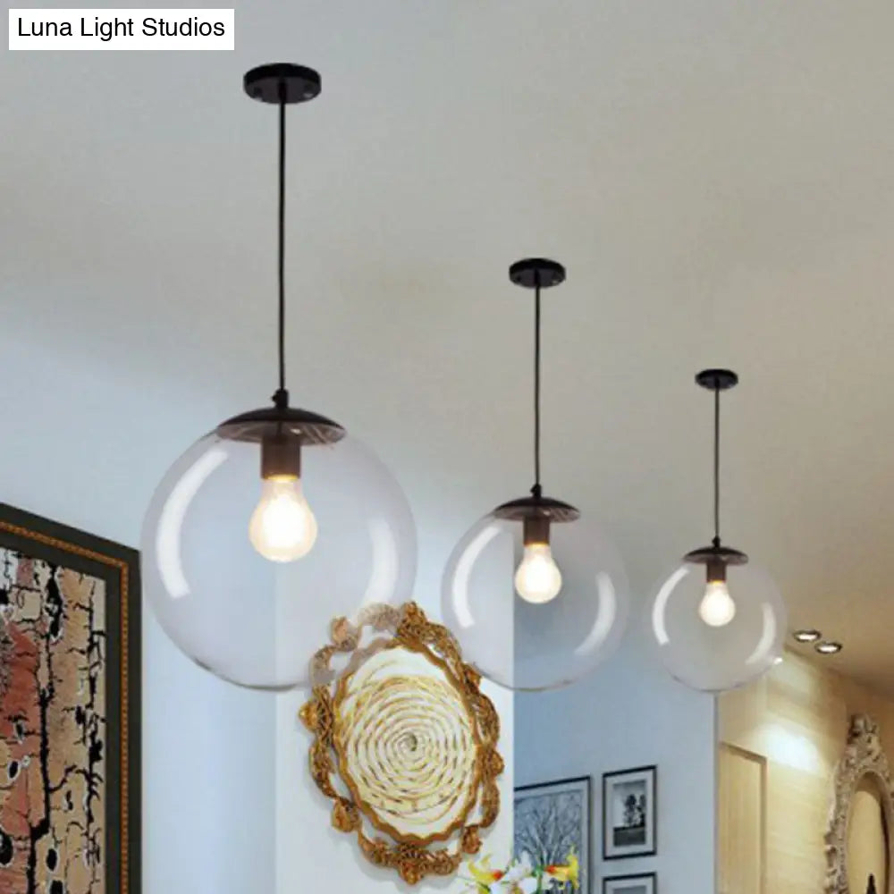 Sleek Clear Glass Pendant Light With A Touch Of Simplicity - Black Spherical Design Suspended