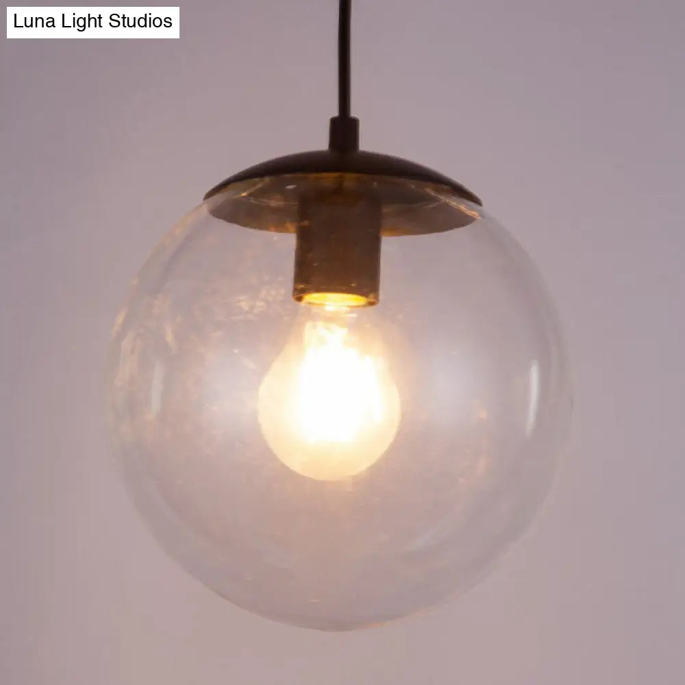 Sleek Clear Glass Pendant Light With A Touch Of Simplicity - Black Spherical Design Suspended