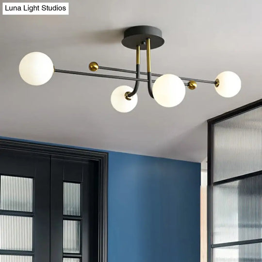 Sleek Cream Glass Ball Semi Mount Ceiling Light With Minimalistic Black And Brass Accents For Dining