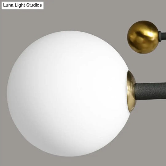 Sleek Cream Glass Ball Semi Mount Ceiling Light With Minimalistic Black And Brass Accents For Dining