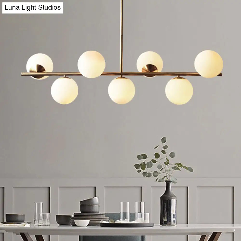 Sleek Cream Glass Spherical Dining Room Pendant Light With 7 Gold Heads - Postmodern Island Lamp