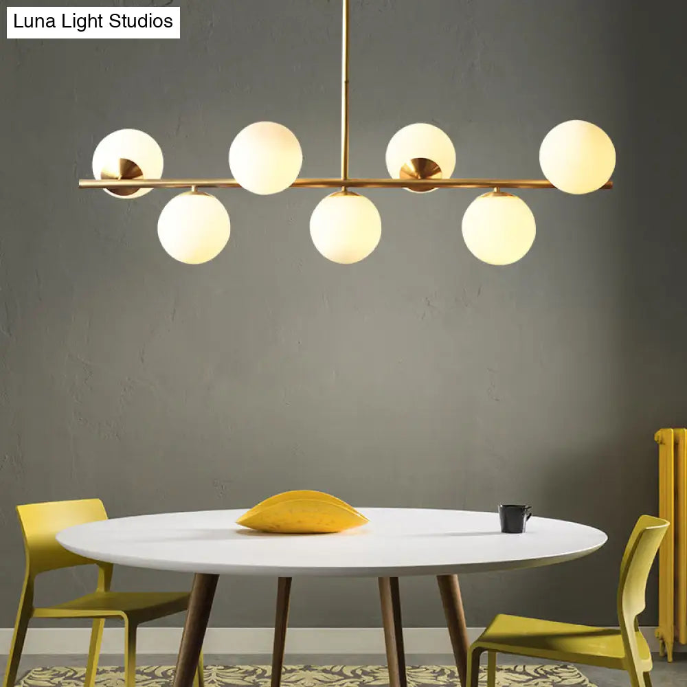 Sleek Cream Glass Spherical Dining Room Pendant Light With 7 Gold Heads - Postmodern Island Lamp