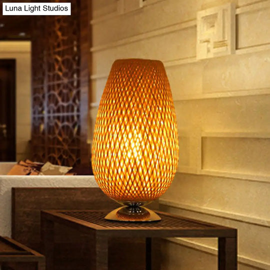 Sleek Egg-Like Rattan Bedside Table Lamp - Single-Bulb Nightstand Light With Wood Accent