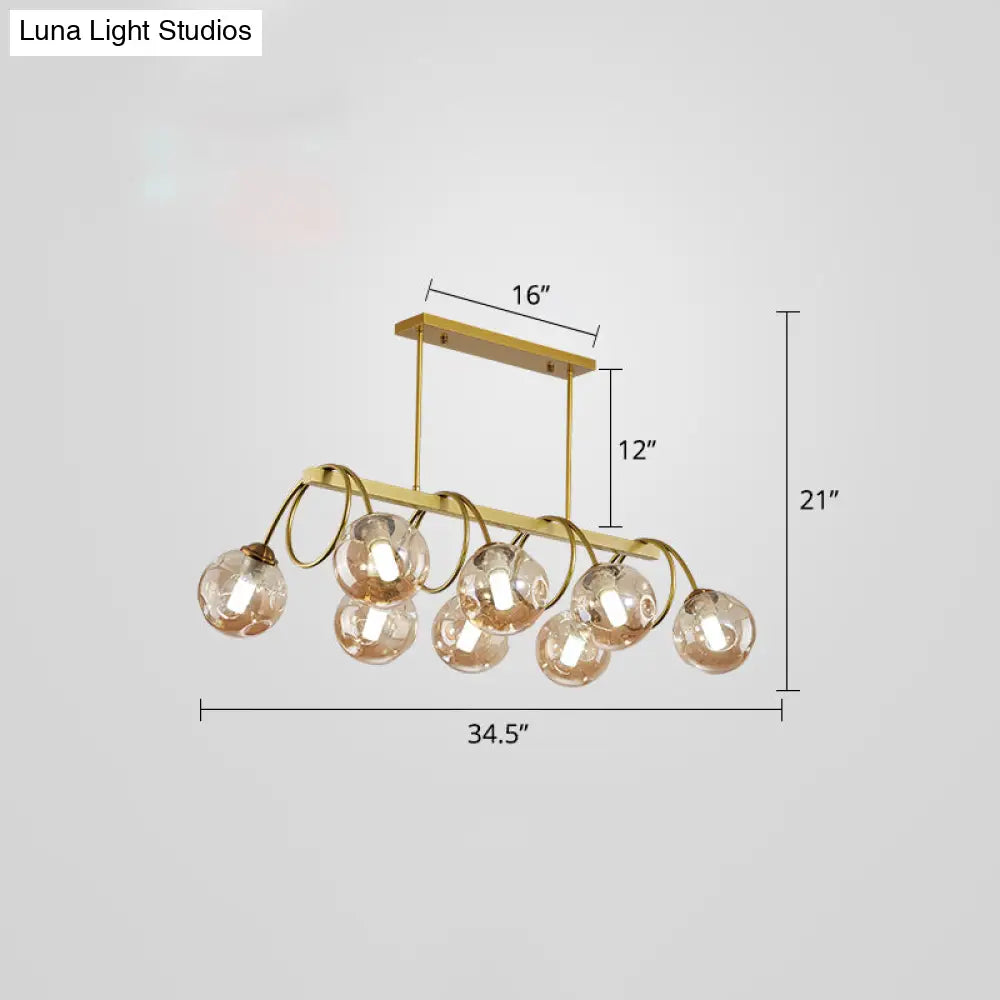 Sleek Gold Spiral Island Light - Post-Modern Metal Ceiling Hang Lamp With Ball Glass Shade