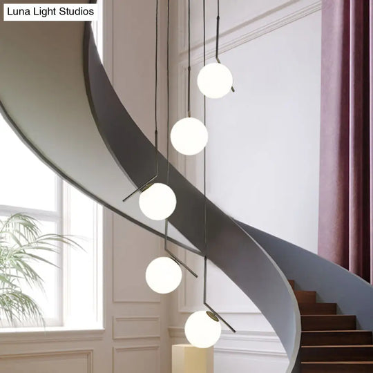 Sleek Opal Glass Globe Spiral Stairwell Pendant Light