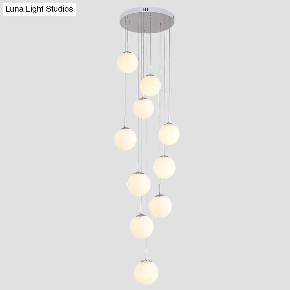Sleek Silver Staircase Pendant Light With Cream Glass Shades - 10 Head Cluster Design