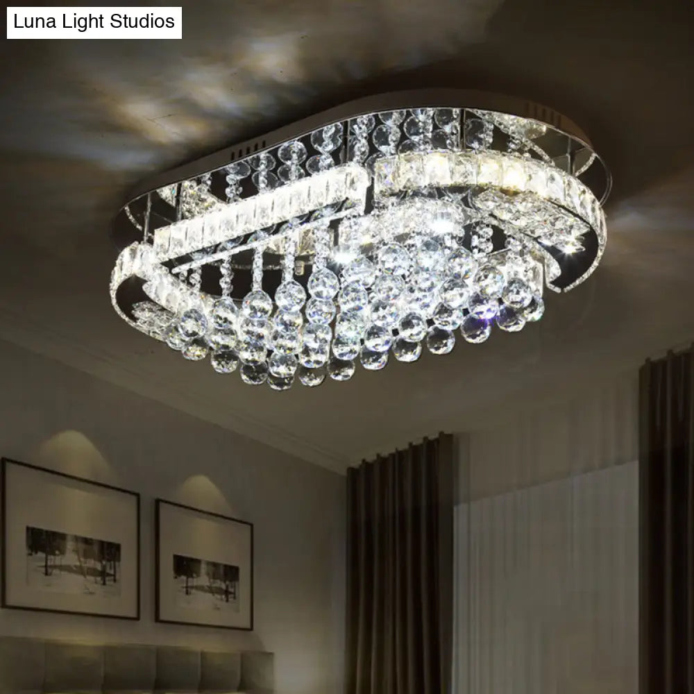 Sleek Stainless-Steel Led Light Fixture With Clear Cut Crystal Blocks And Oval Semi Flush Design