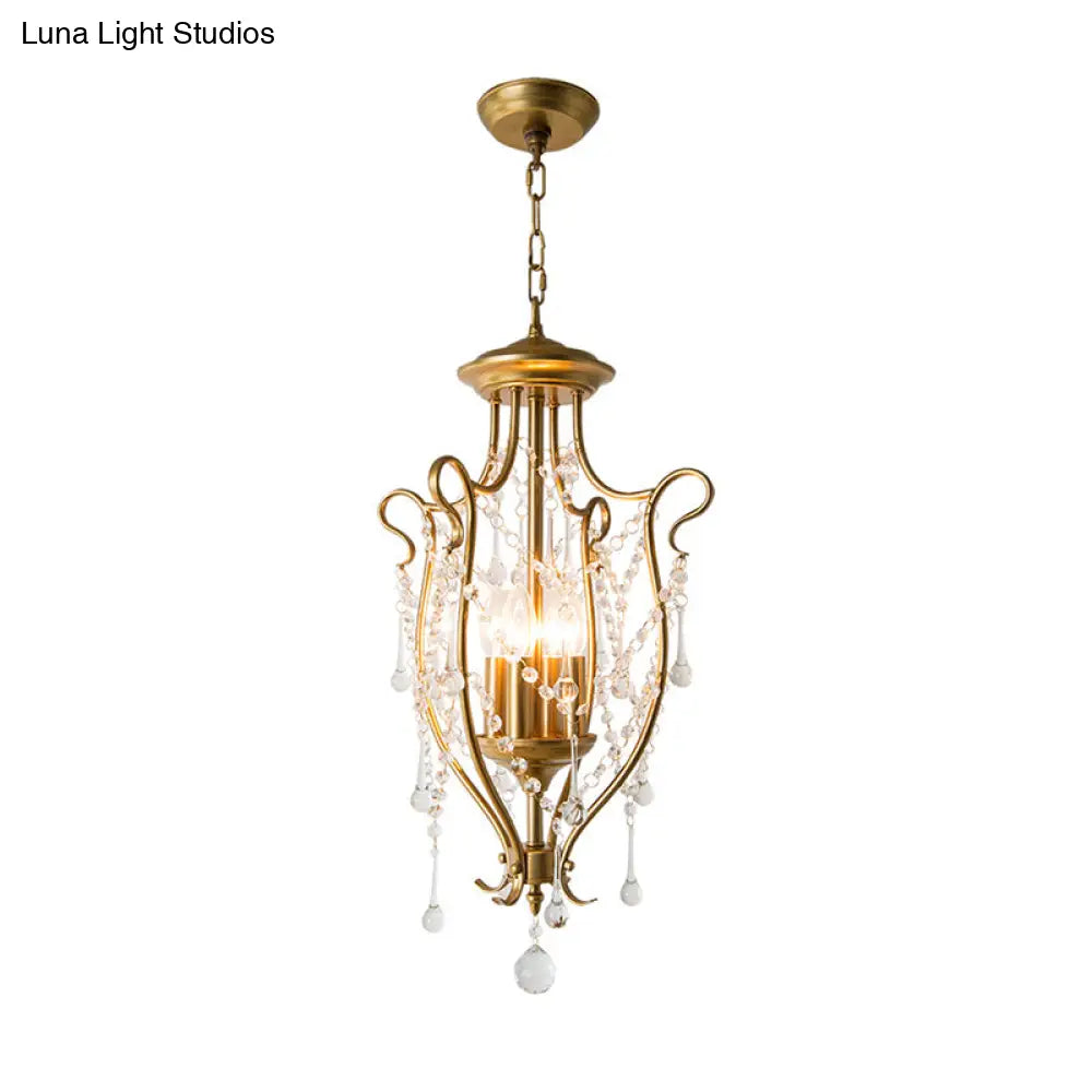 Sleek Swirled Iron Pendant Light With Crystal Stands For Dinning Hall