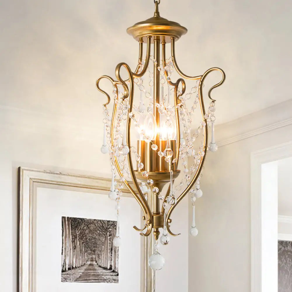 Sleek Swirled Iron Pendant Light With Crystal Stands For Dinning Hall Brass