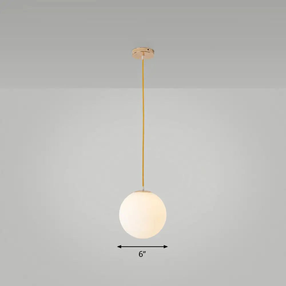 Sleek White Glass Pendant Light For Minimalist Table Settings / 6’