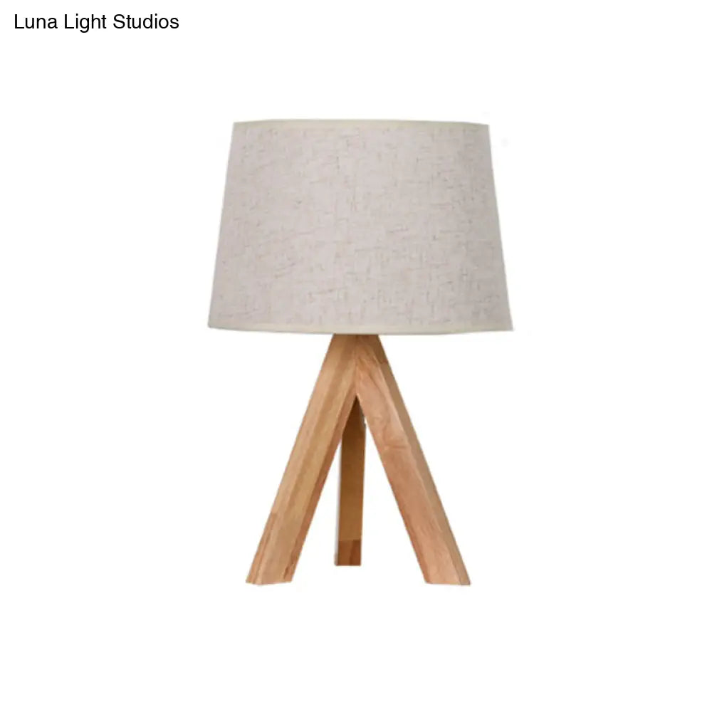 Sleek White Tripod Bedside Lamp With Fabric Shade - Tapered Table Lighting Simplicity