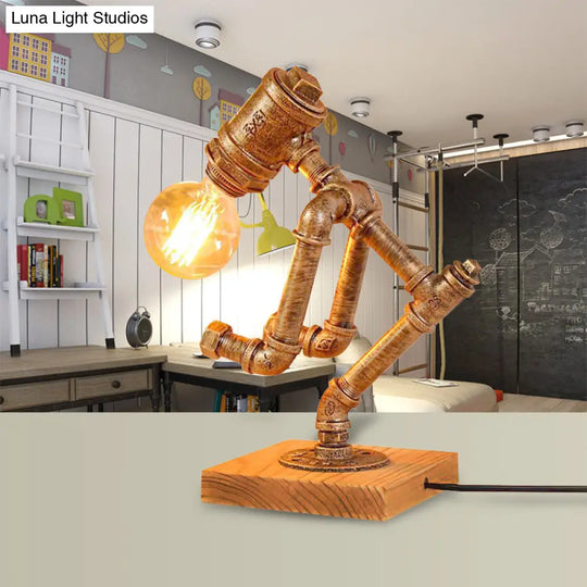 Steampunk Style Bronze Metal Table Lamp With Robot Athlete Design - 1 Light Lighting For Bedroom