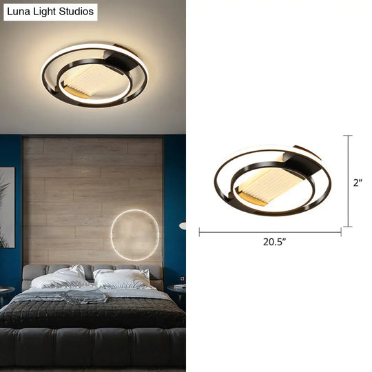 Stylish Bedroom Glow: Black Metallic Led Flush Mount Ceiling Light With A Simple Halo Design