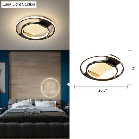 Stylish Bedroom Glow: Black Metallic Led Flush Mount Ceiling Light With A Simple Halo Design