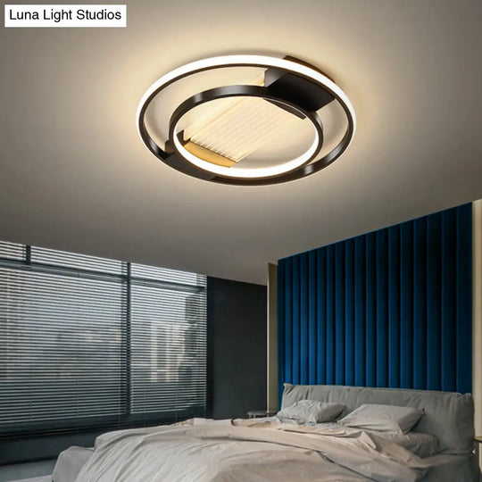 Stylish Bedroom Glow: Black Metallic Led Flush Mount Ceiling Light With A Simple Halo Design