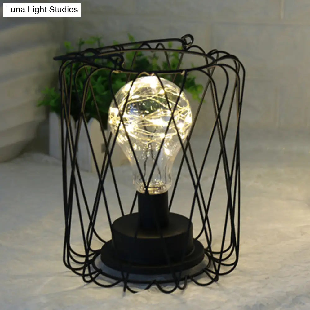 Stylish Black Metal Table Lamp With Cage Shade - Ideal For Bedside Or Loft Decor