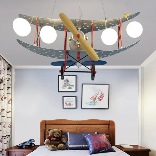 Stylish Blue Metal Chandelier With 4 Plane Hanging Lights For Living Or Nursing Room