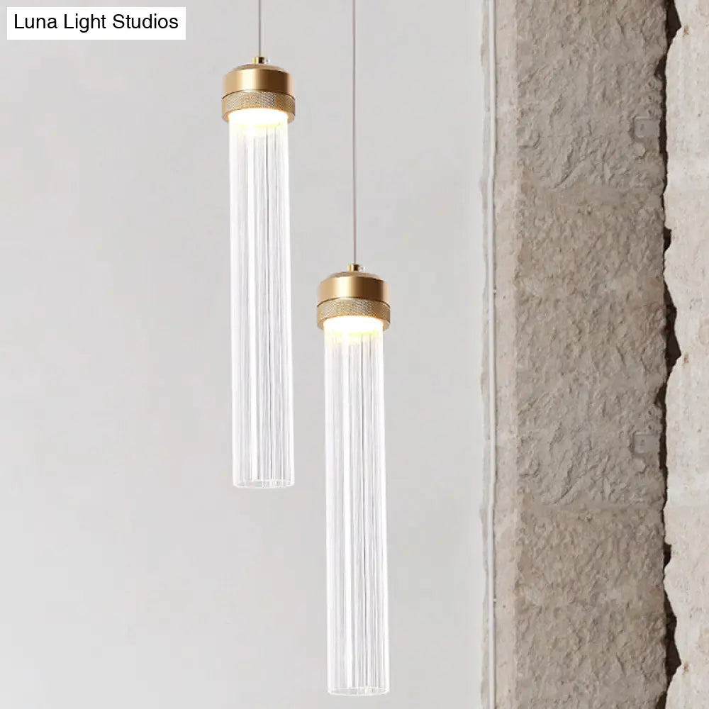 Stylish Gold Cylinder Pendant Light With Clear Glass Shade - Ideal For Restaurants And Bedrooms