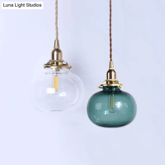 Stylish Oval Pendant Light In Brass With Glass Shade - Perfect For Cloth Shop